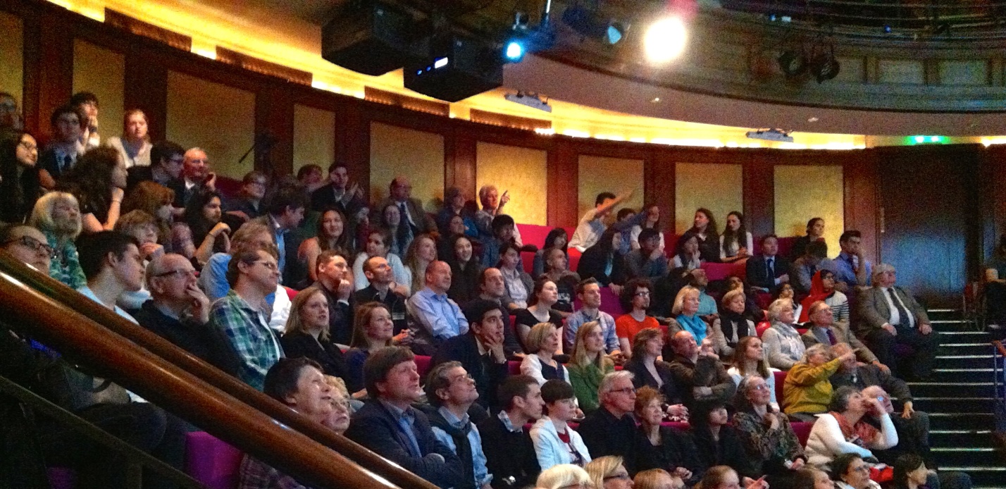 Audience interacting in lecture